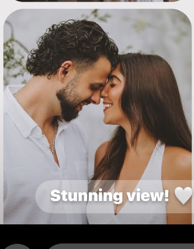 Foreheads together, smiling
